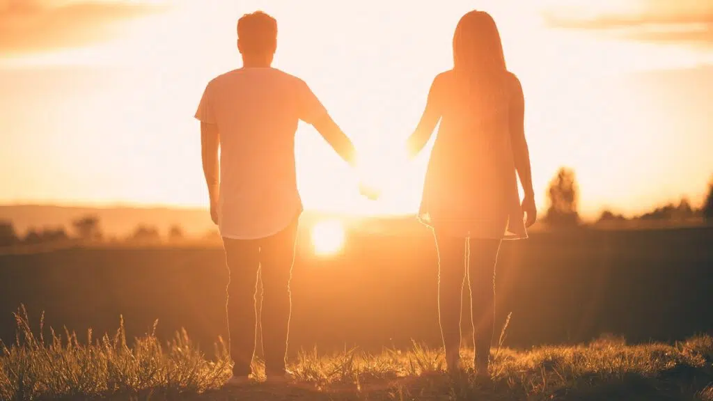 A couple holding hands at sunset, symbolizing relationship healing and renewed connection. Zip Codes: Austin area 78746, 78730, 78733, 78739, 78732, 78701, 78703. Round Rock area 78681, 78665, 78641, 78717, 78613.